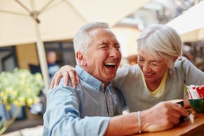 Happy married couple laughing and enjoying the moment