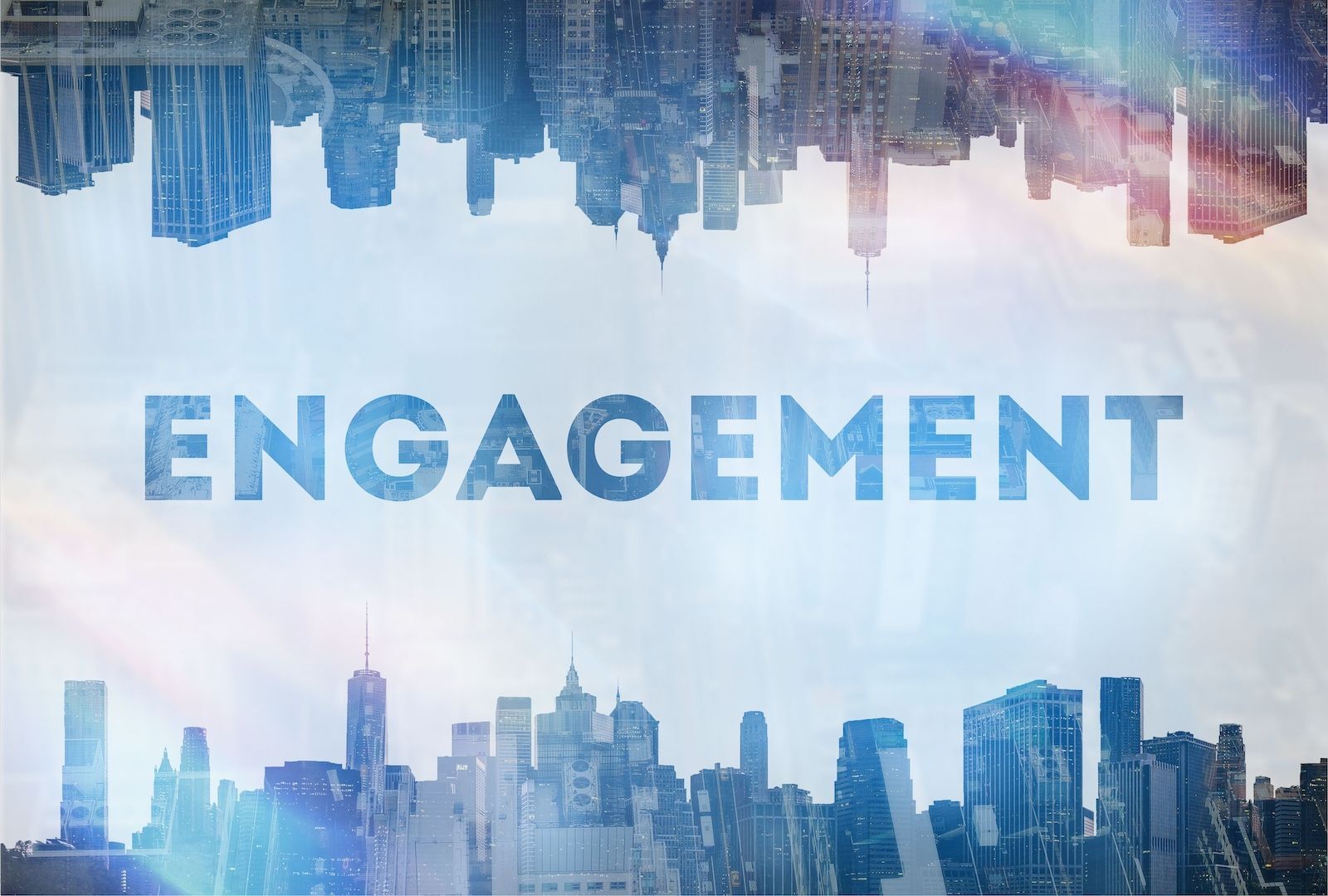 The words ENGAGEMENT overlooking the city representing employee engagement.