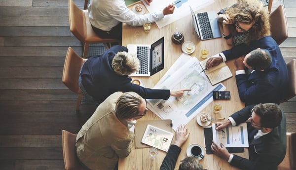 Team collaborating at a project meeting