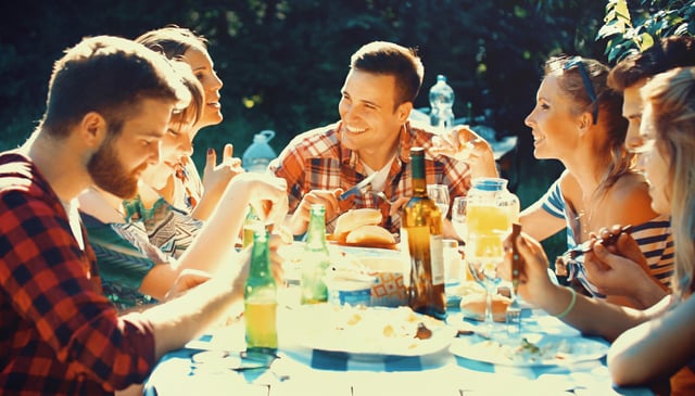 Friends at a backyard dinner party