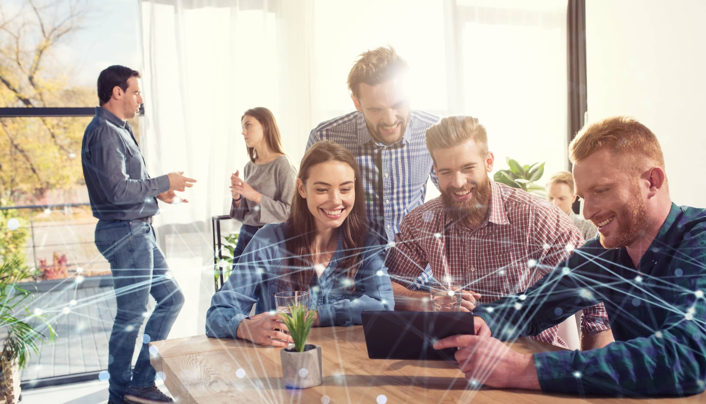 A business team with a digital overlay.