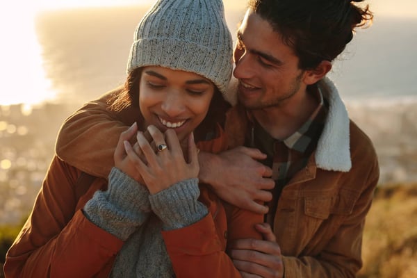 Black couple hugging and connecting