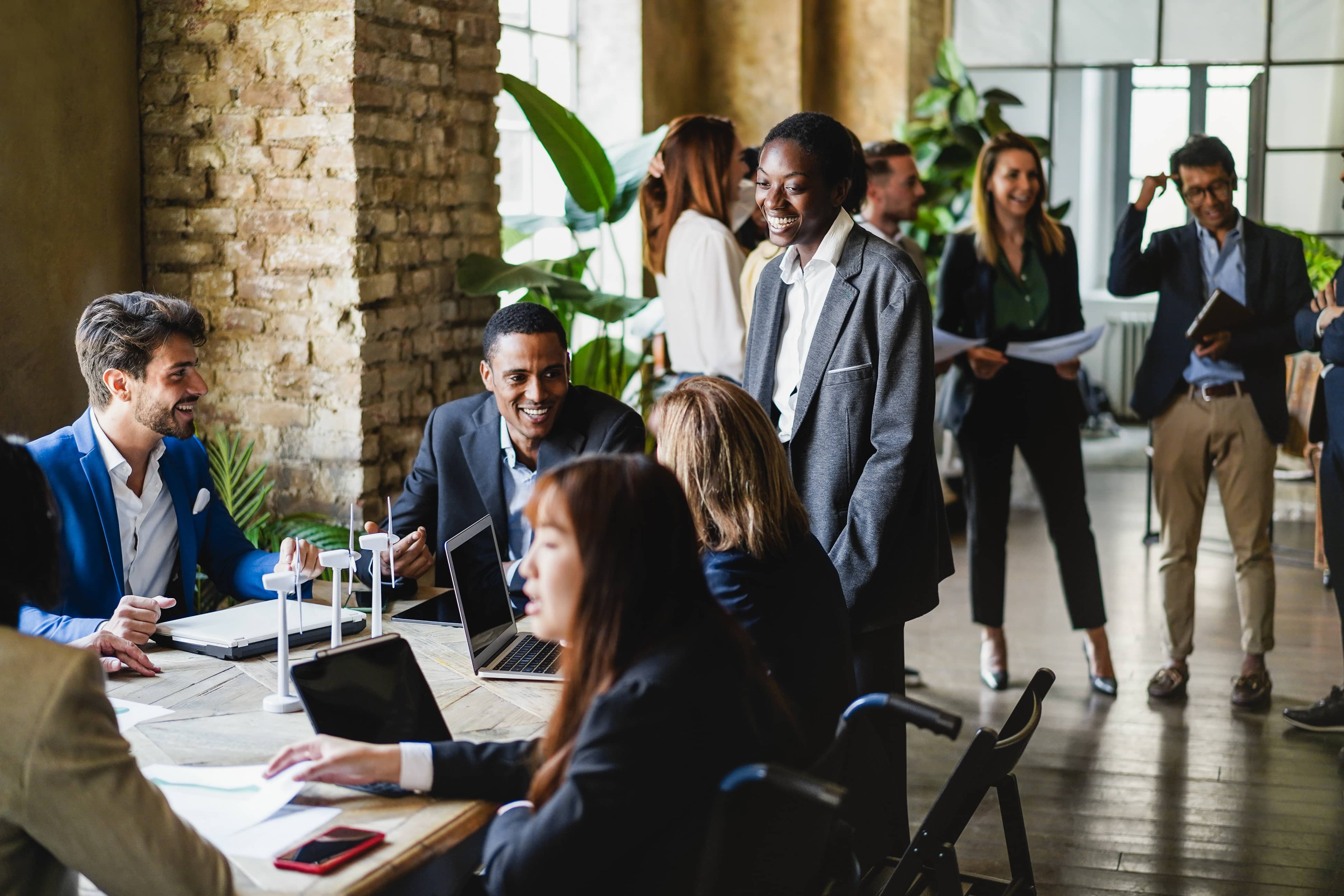 Business office with employees interacting.