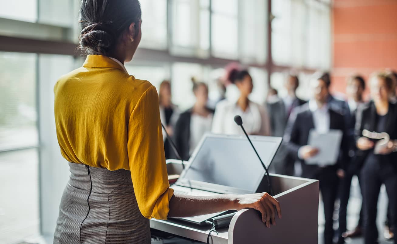 Business associates attending a live presentation.