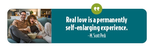 Love as a self-enlarging experience