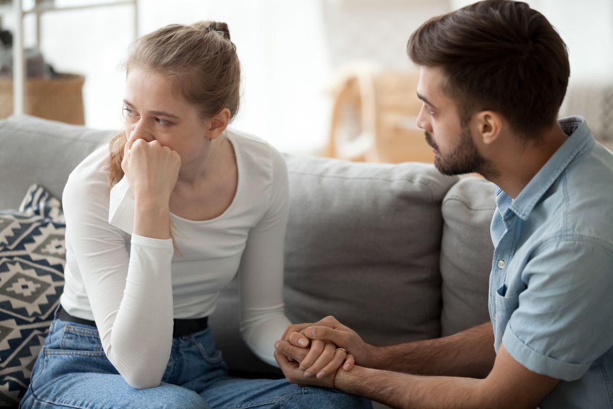 Caring husband shows empathy with his wife