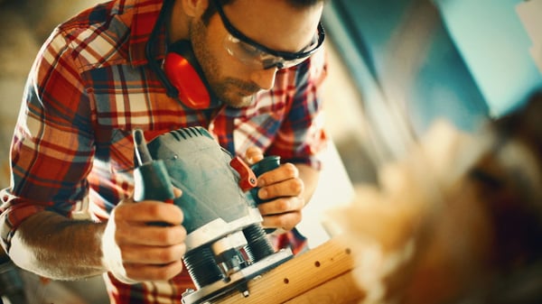 Carpenter finishing a woodworking project