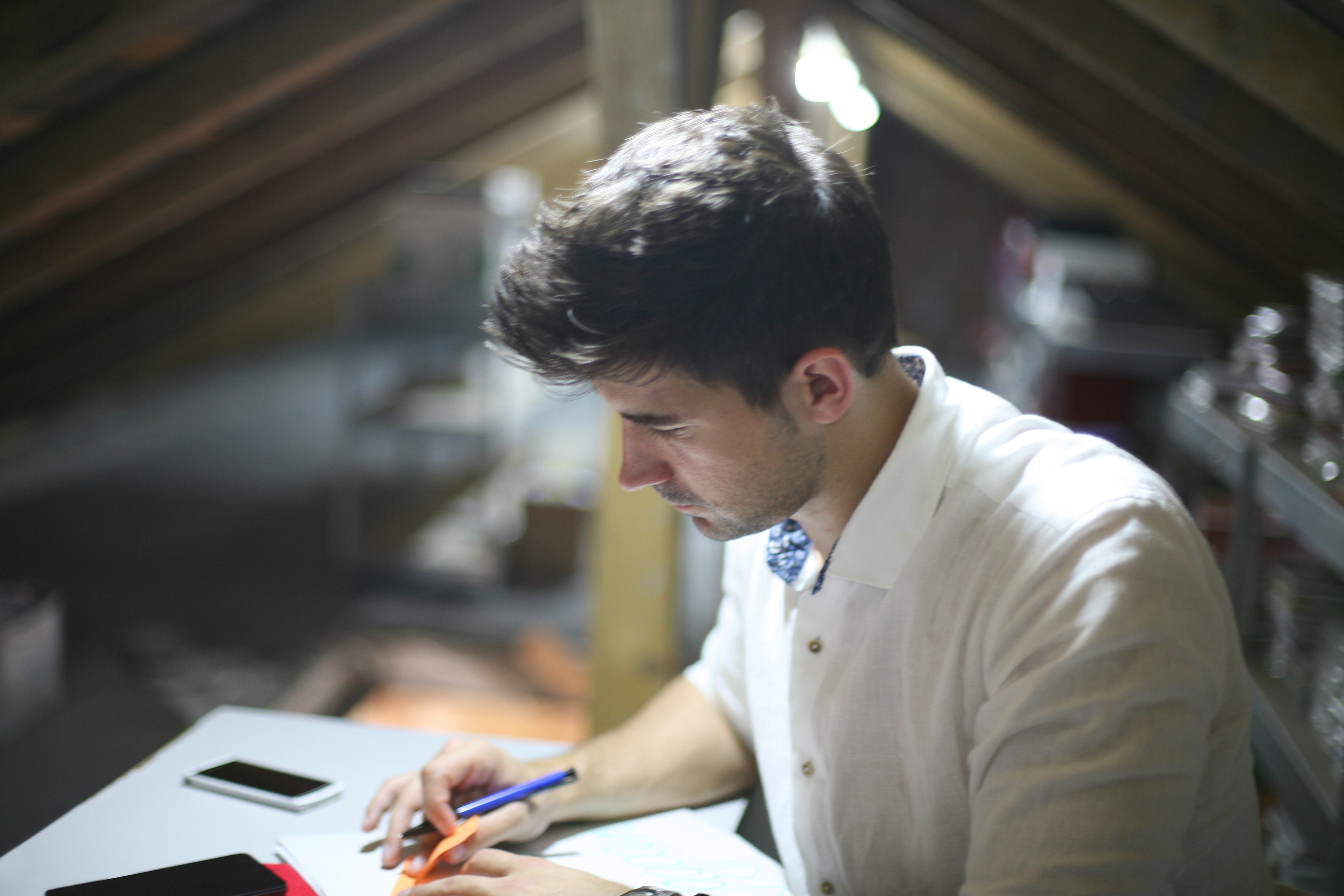 Businessman working hard at his desk.