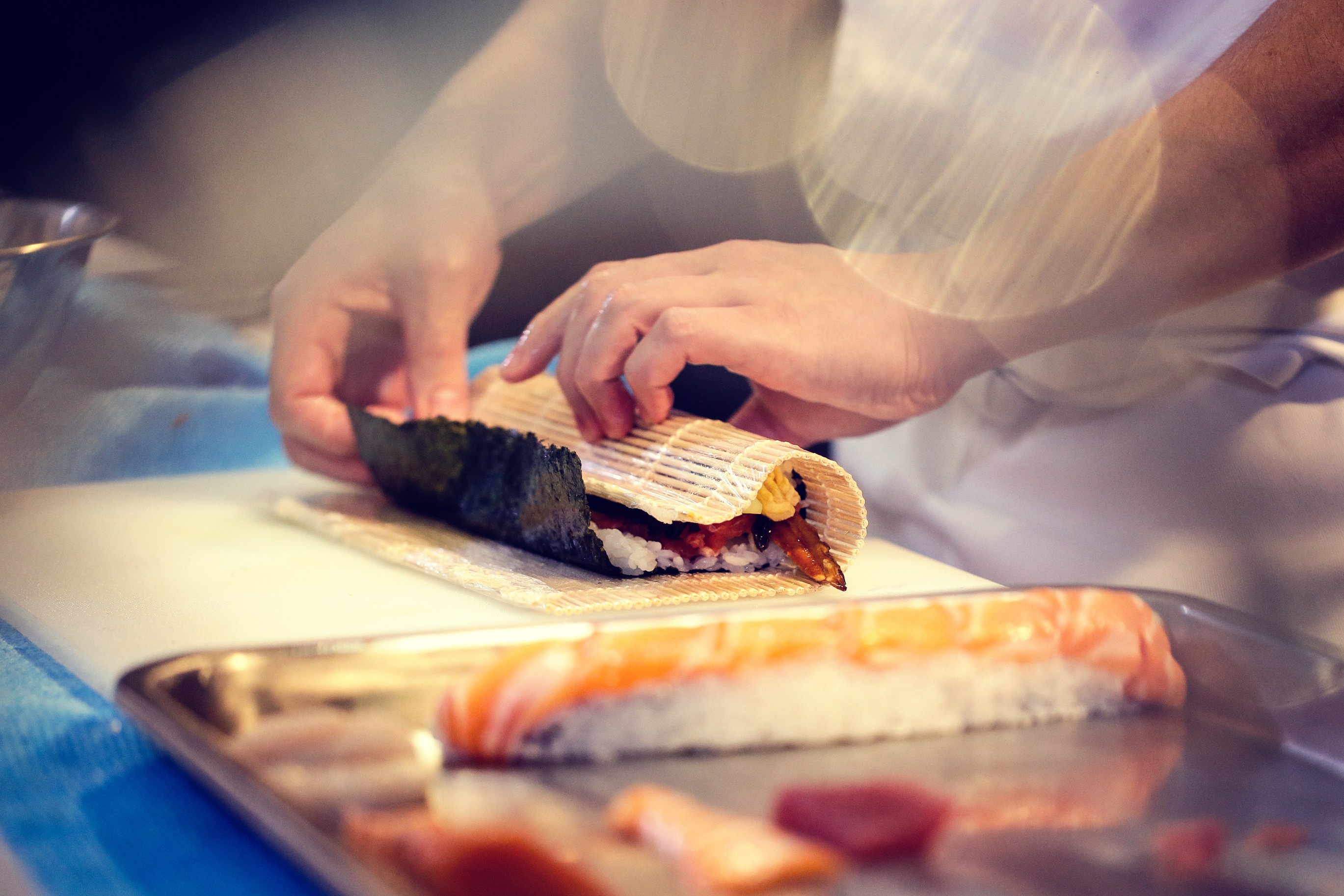 Sushi chef applying principles of success