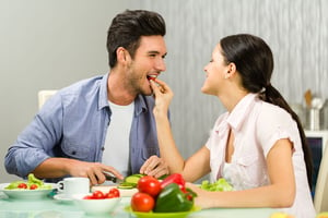 A couple eating a healthy meal together