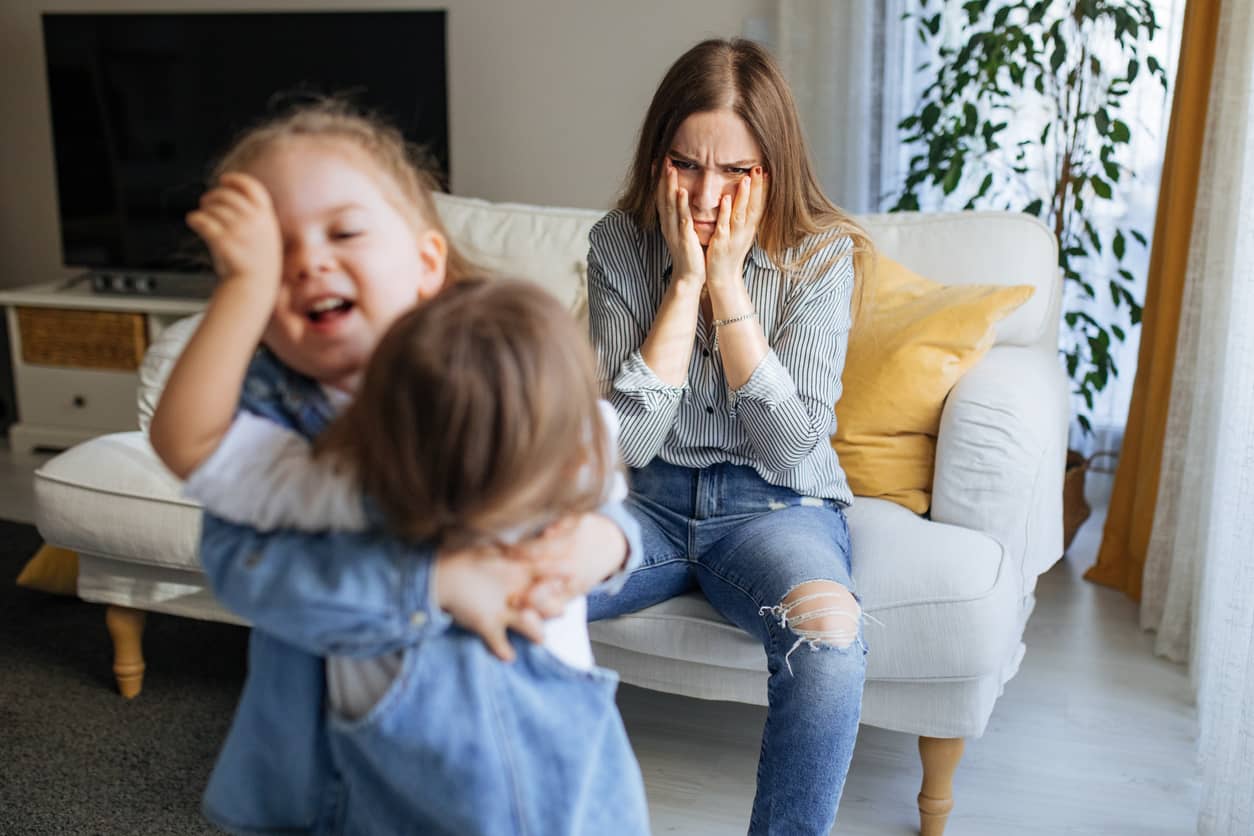 A frustrated stepmother dealing with sibling rivalry.