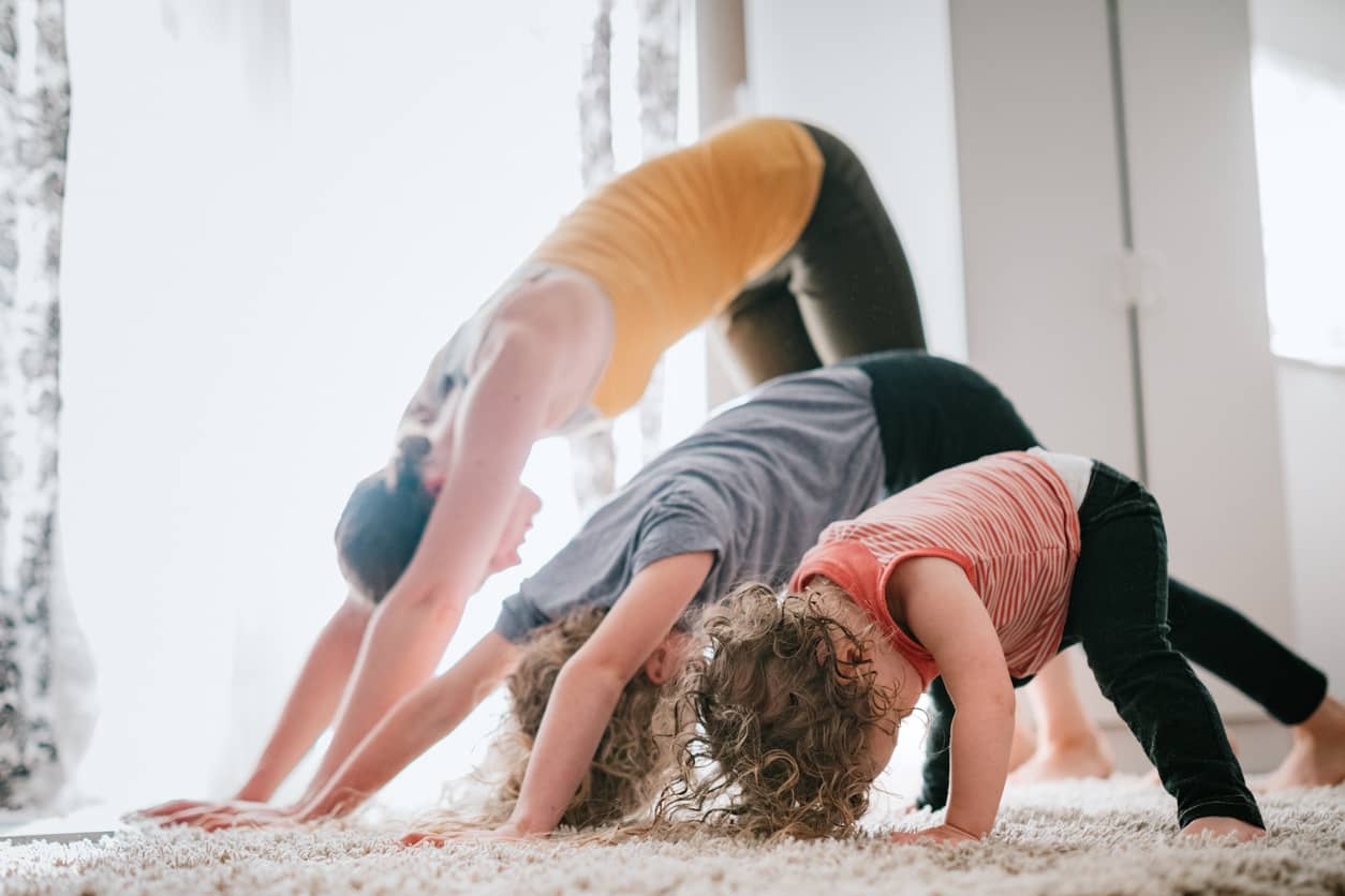 Family doing yoga together