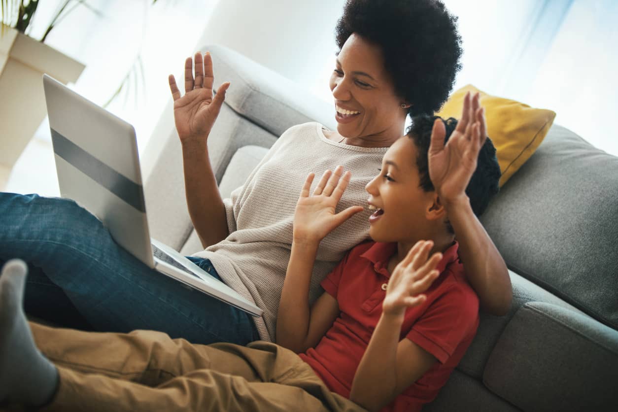 A mom and son playing virtual charades