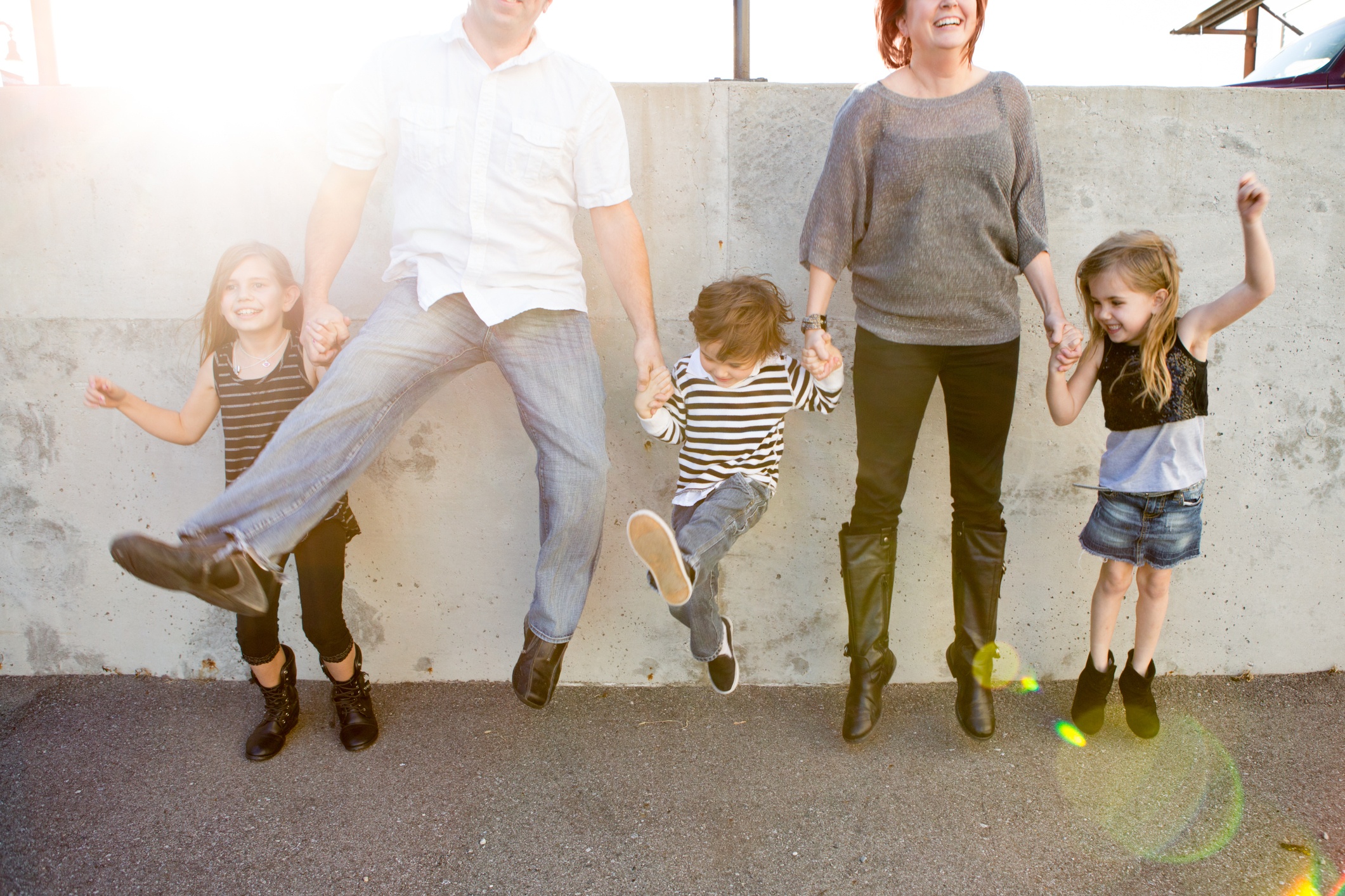 Family playfully dancing together