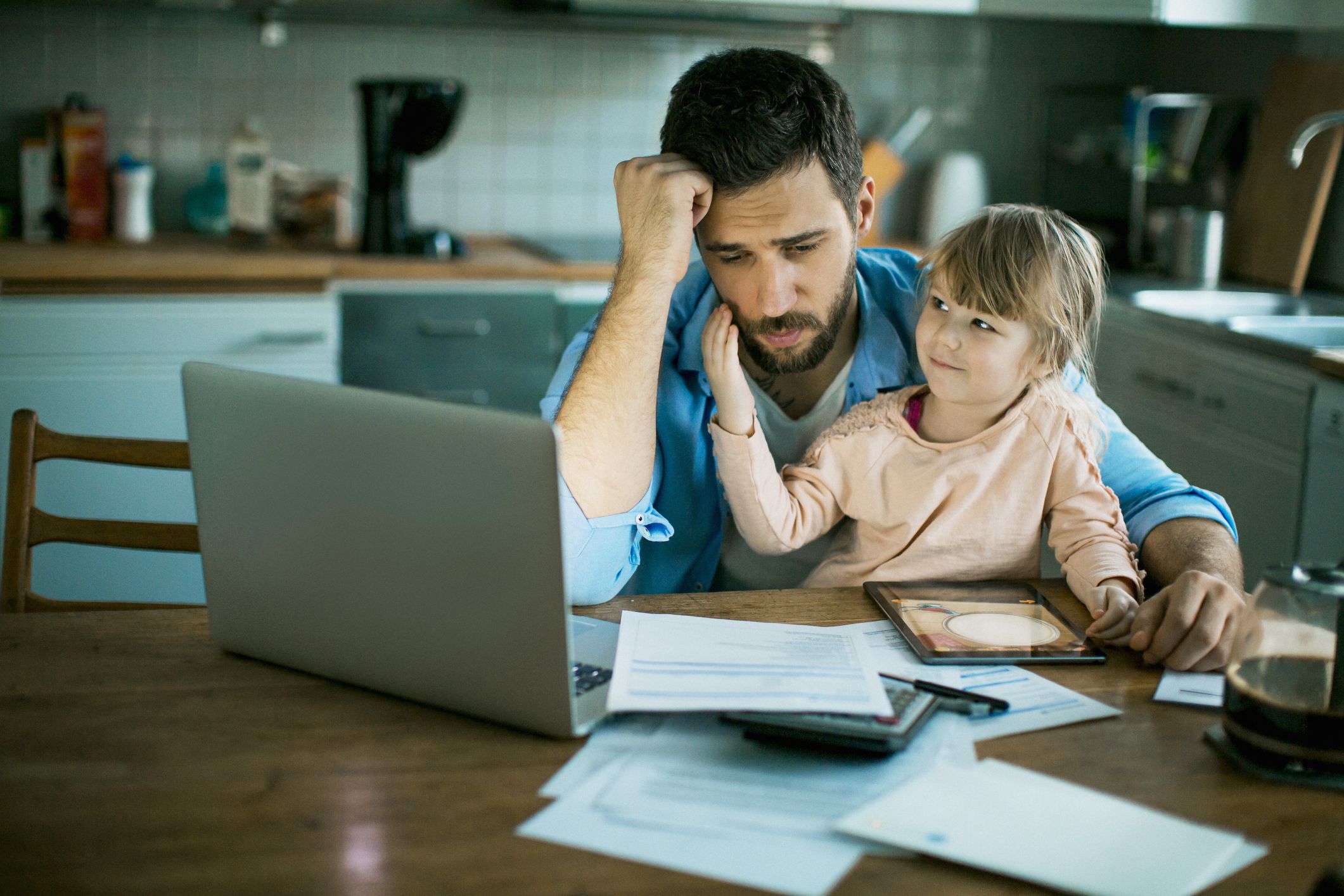 A dad needing emotional fitness while a child tunes into her parents's stress