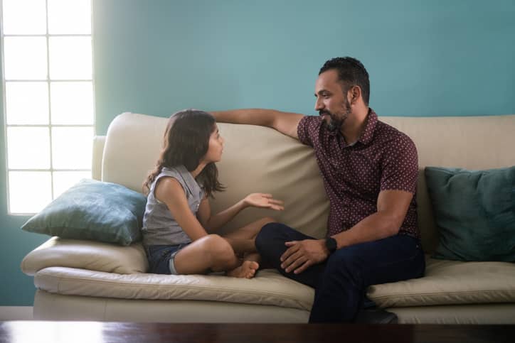 Father and his stepdaughter having an honest conversation.