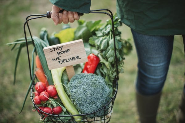 An example of compassion is teens delivering food to elders