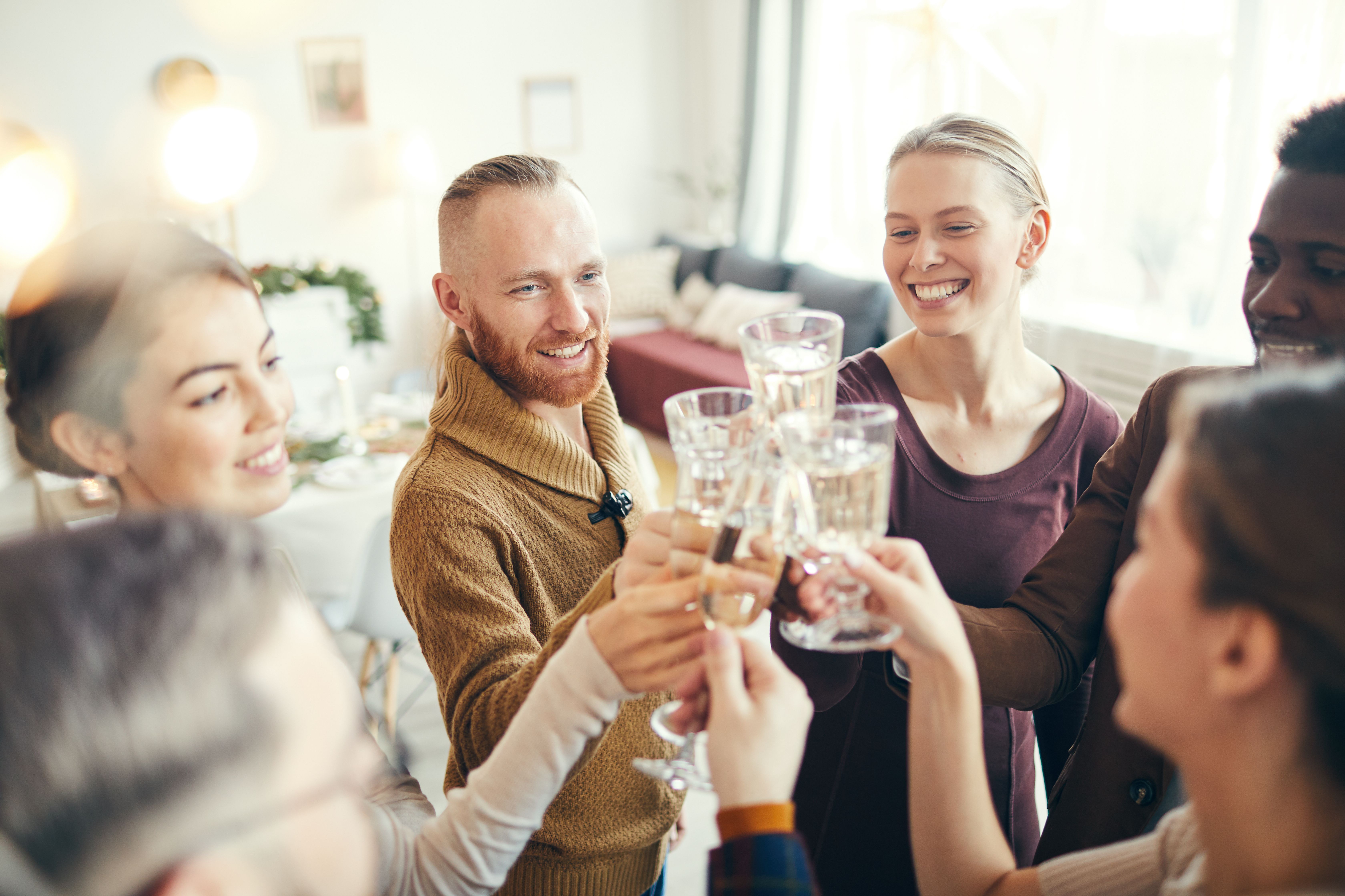 Friends toasting and celebrating their accomplishments.