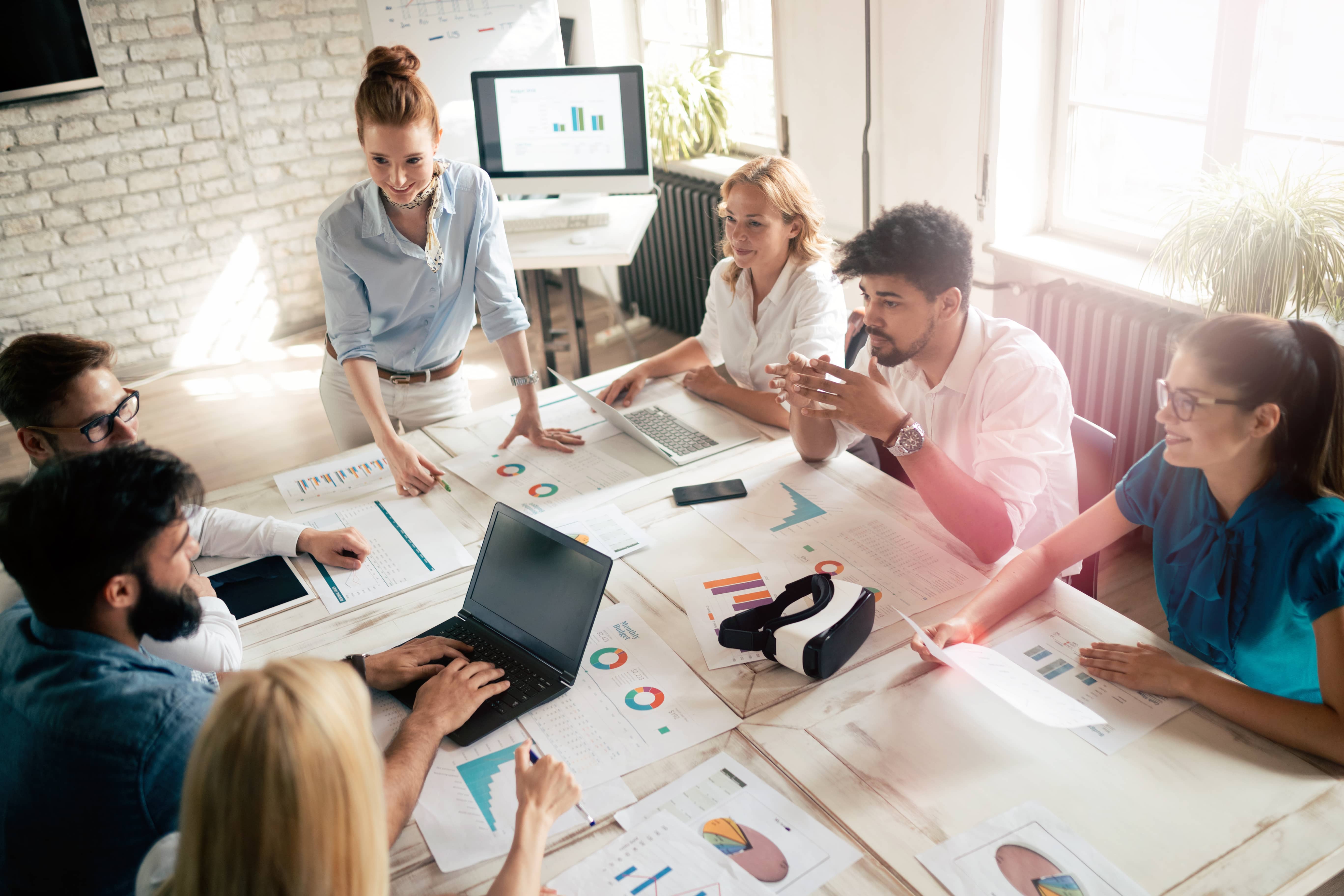 Group of young businesspeople or designers work with new startup project in office_AdobeStock_236777581 Compressed-1