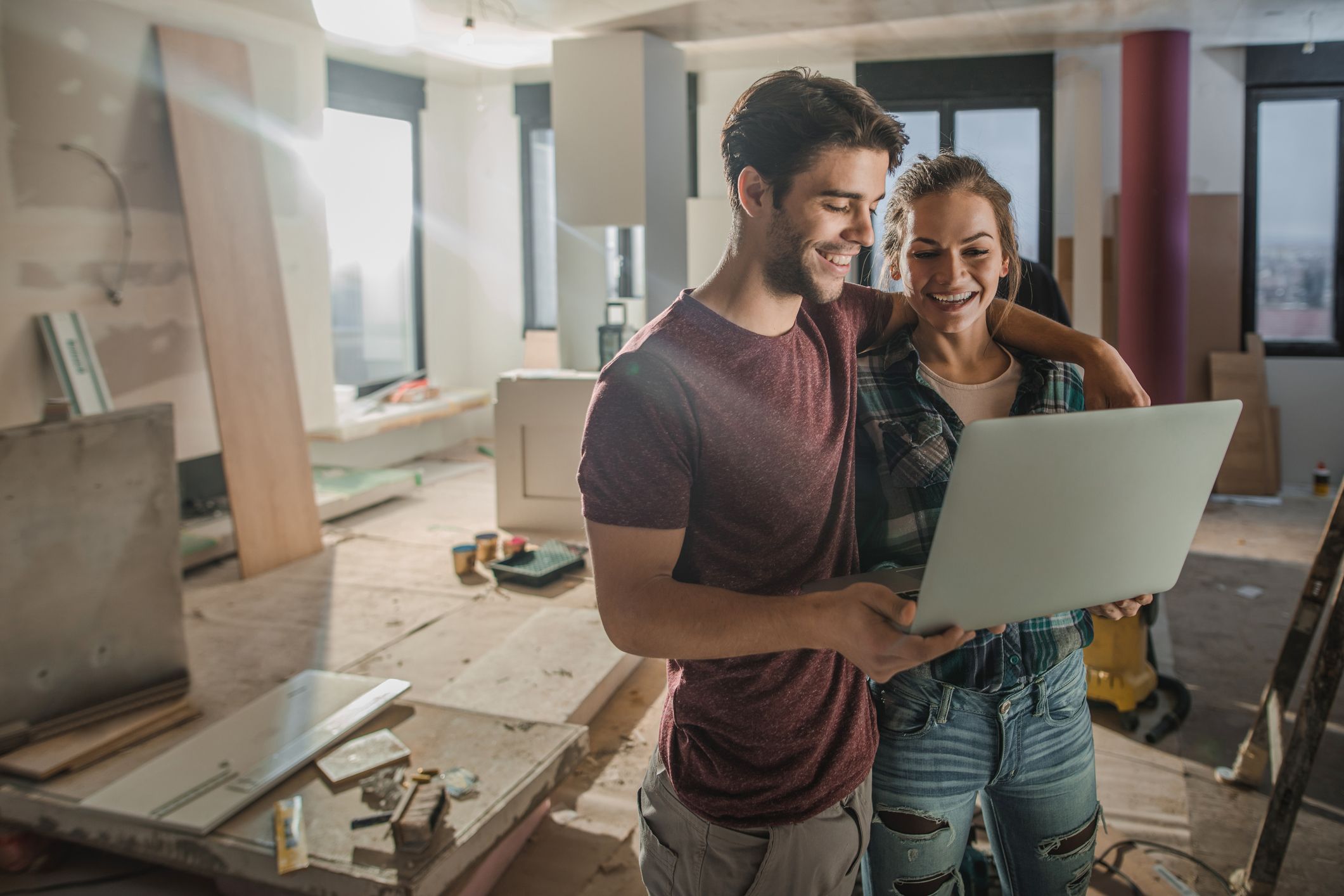 A married couple renovating their home