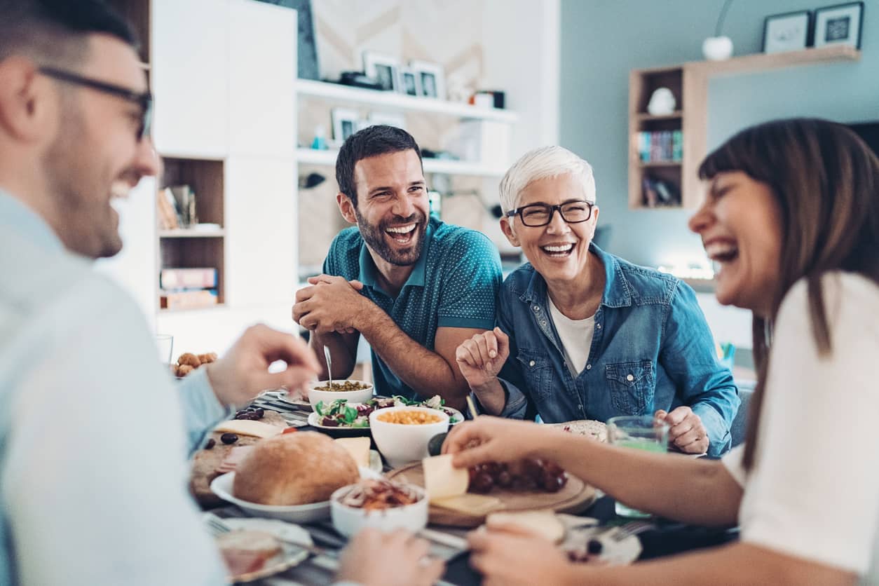 Friends and family enjoying dinner together