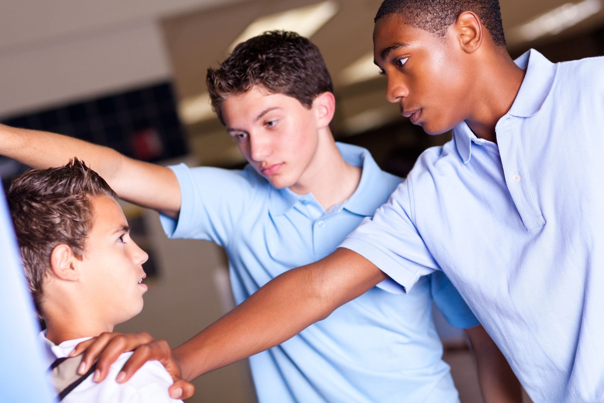 Boys bullying another student