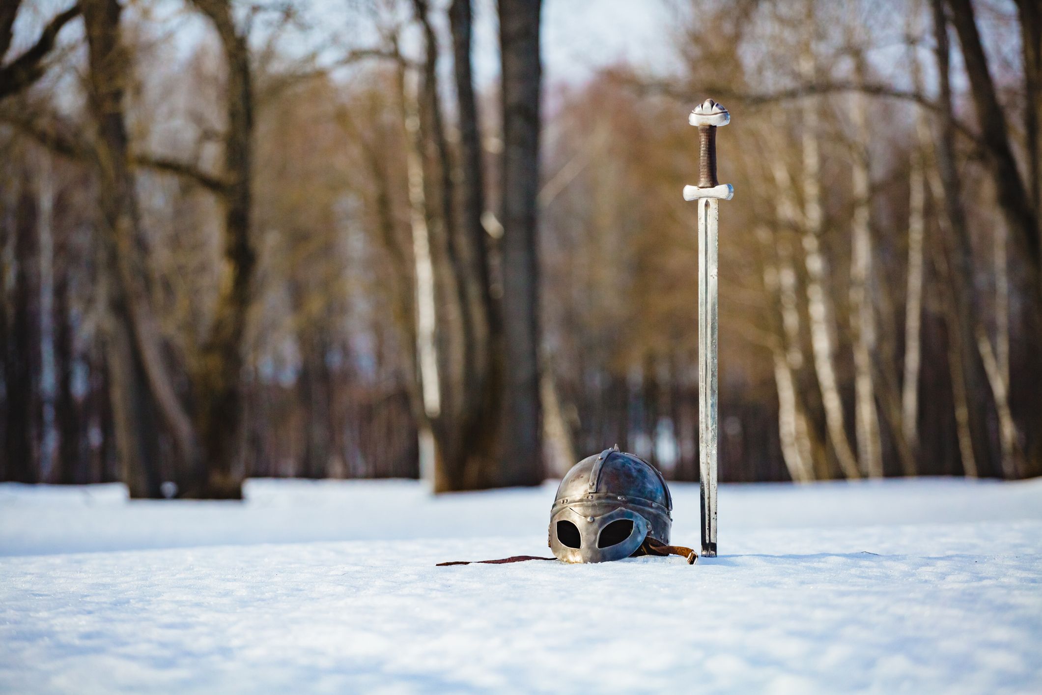 Sword and helmet in the snow