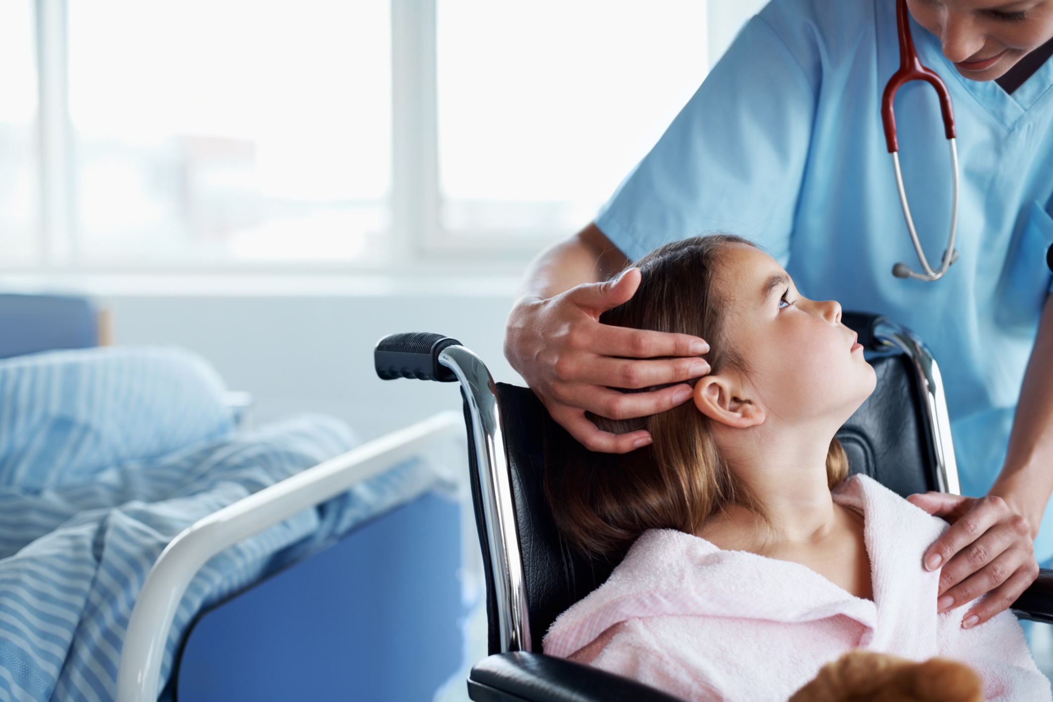 Nurse showing empathy to a young girl