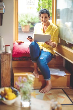 Woman spending alone time at a window