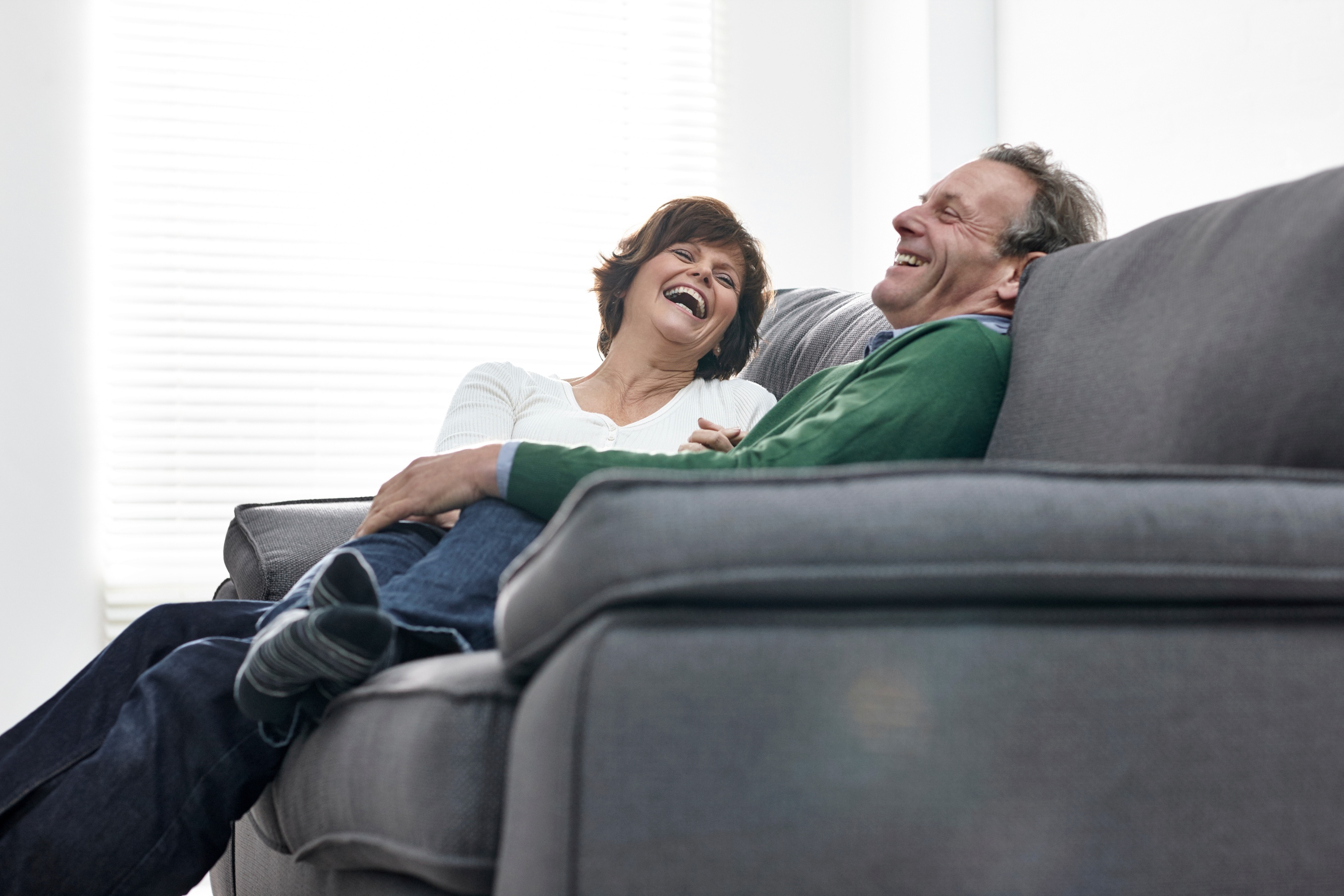 Married couple talking and laughing 