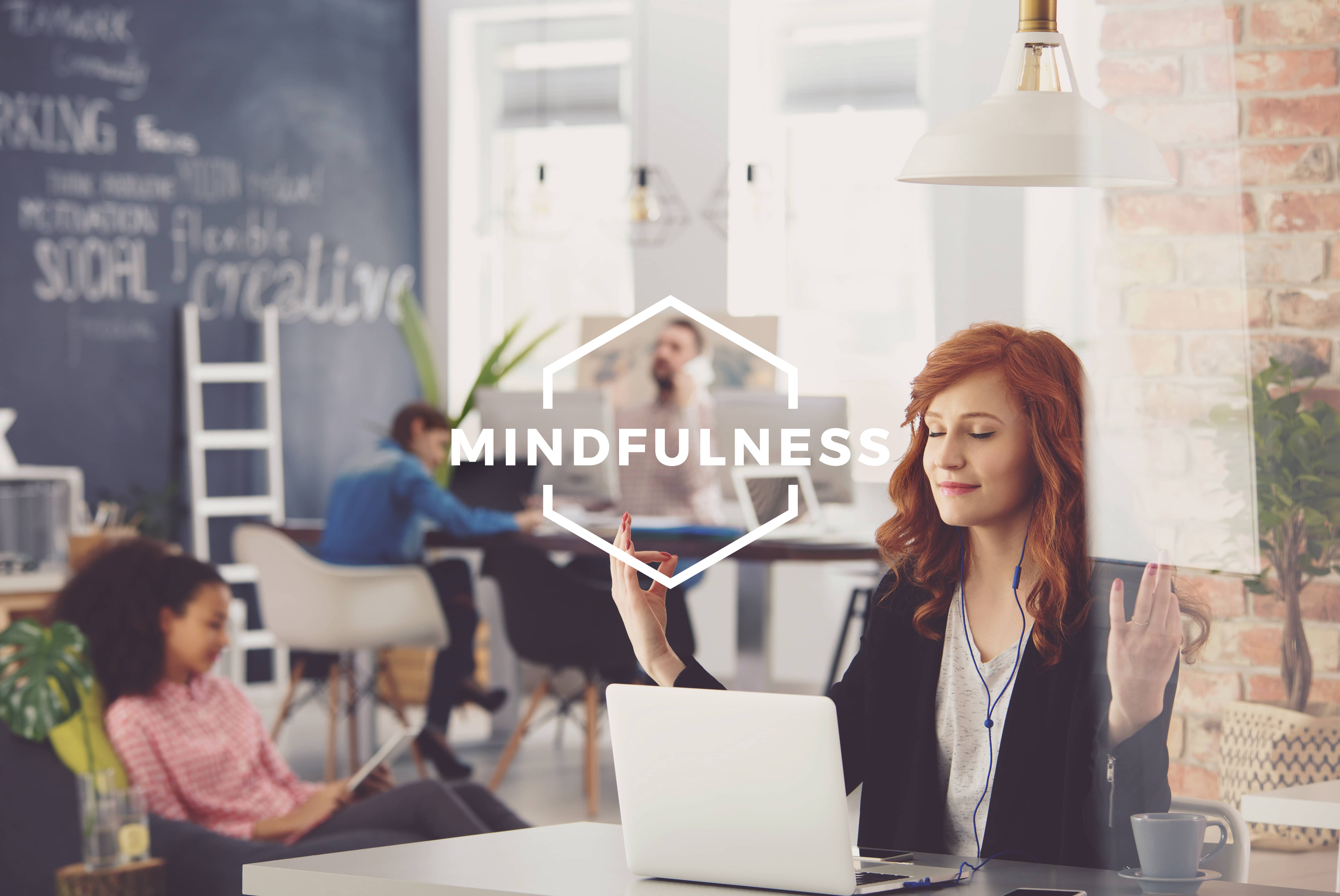 Mindful lady at computer in office_AdobeStock_142240156 Compressed
