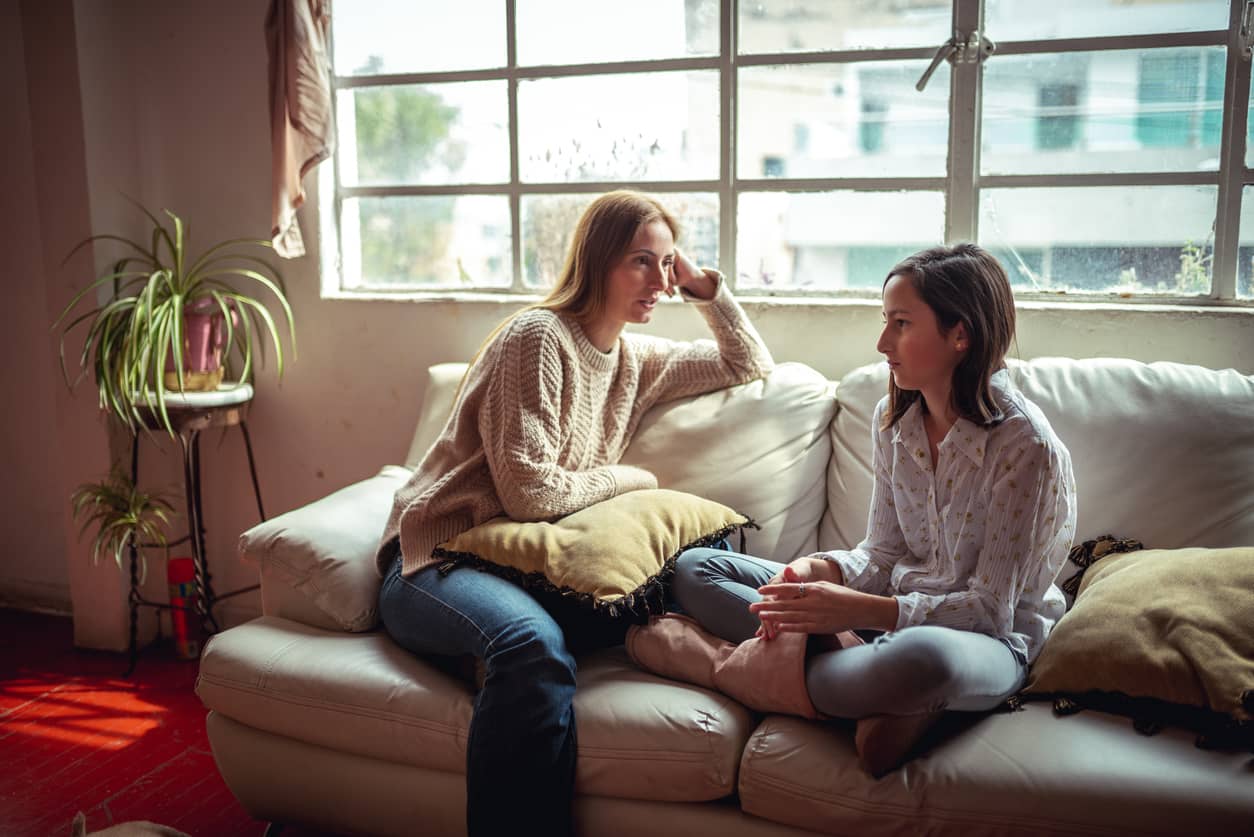 Mother and daughter having a talk about concerns of back to school