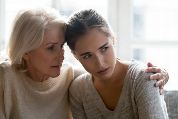 Mother comforting and empathizing with her daughter