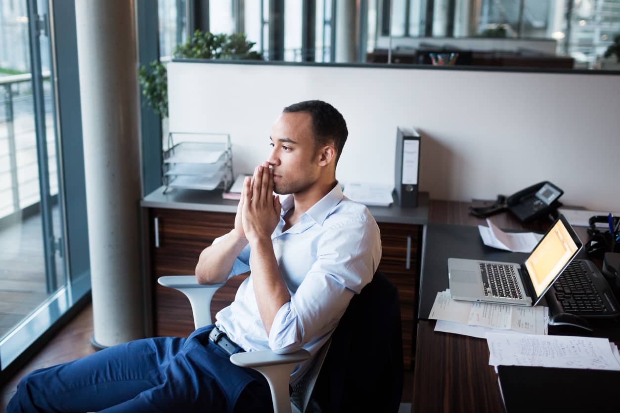 Pensive man contemplating and gaining self-awareness