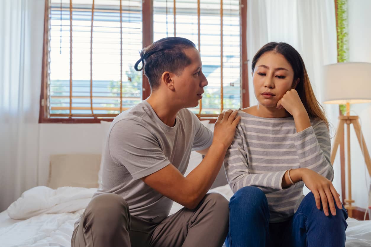 Asian husband showing empathy in communication