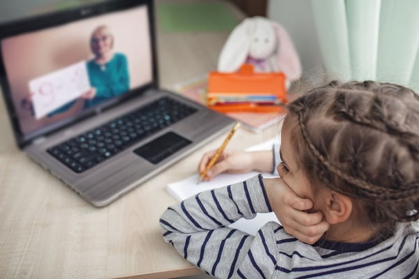 Young girl learning virtually during quarantine