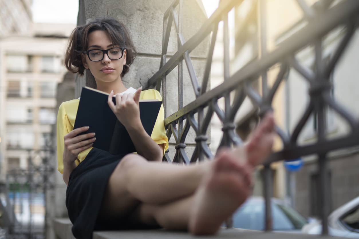 Woman reading on social intelligence