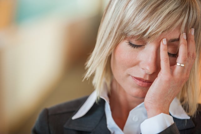 Woman sorting through conflicted feelings to find inner peace