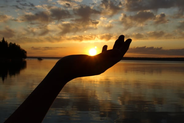 With inner peace and gratitude you hold the sun in your hand