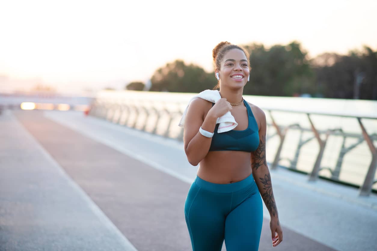 Young black woman going home after running-in-the-morning