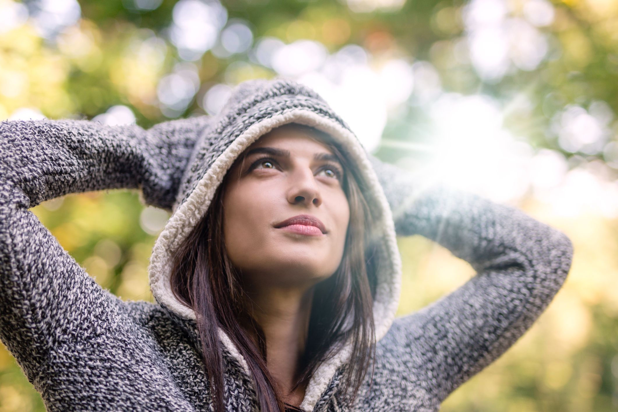 Young woman stretching to regulate her emotions.