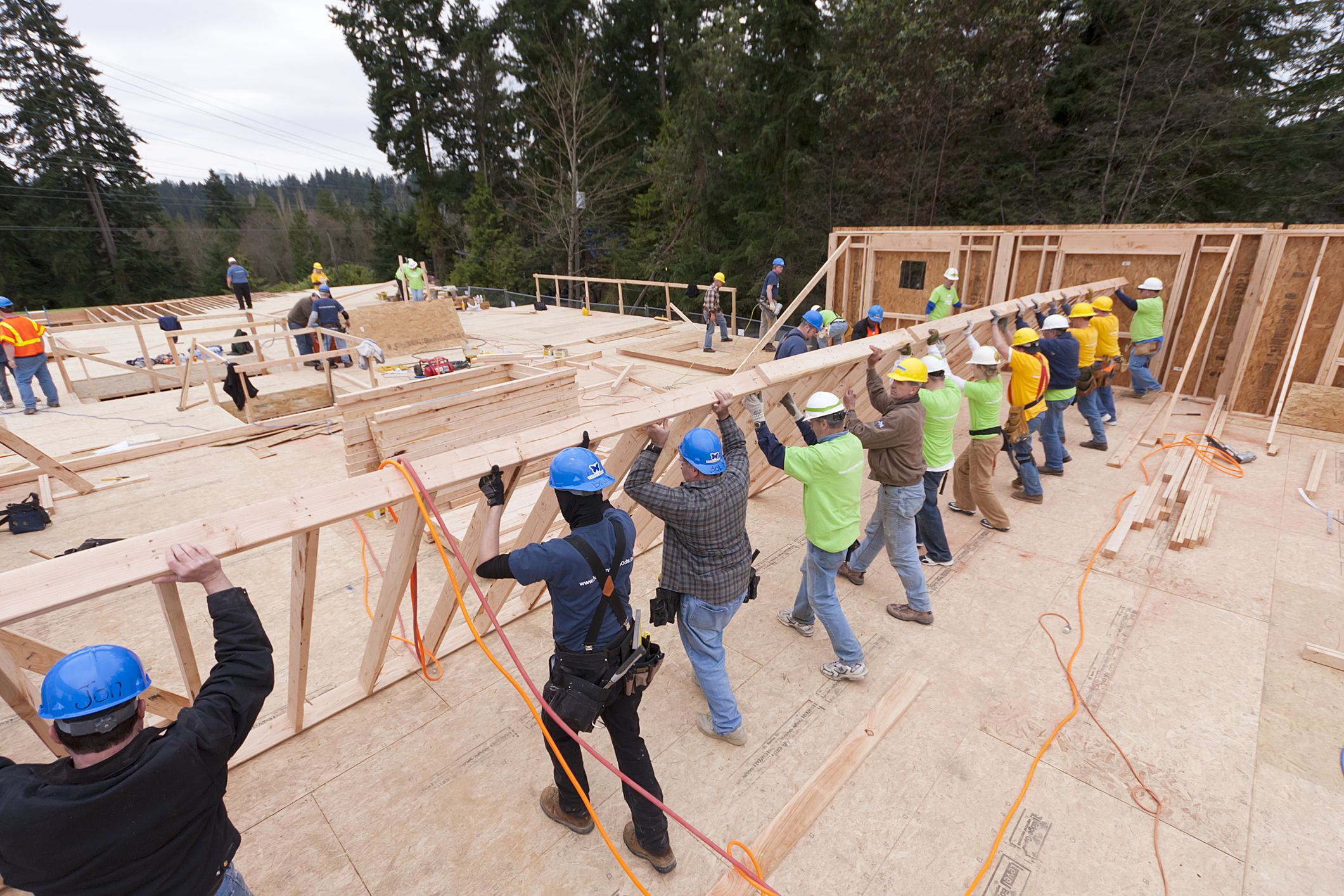 Volunteers help rebuild homes lost in natural disasters