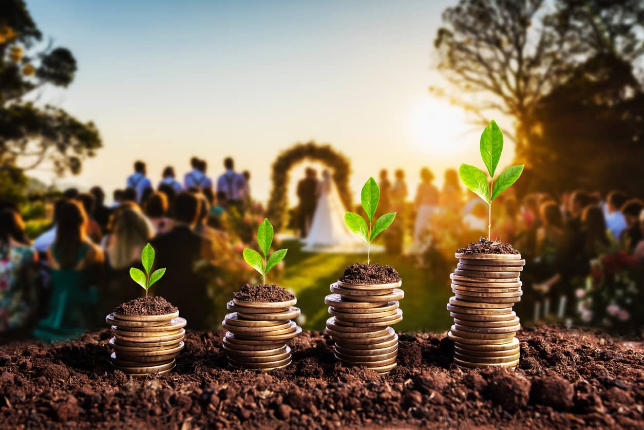 Finance and money concept overlaid on a wedding ceremony.
