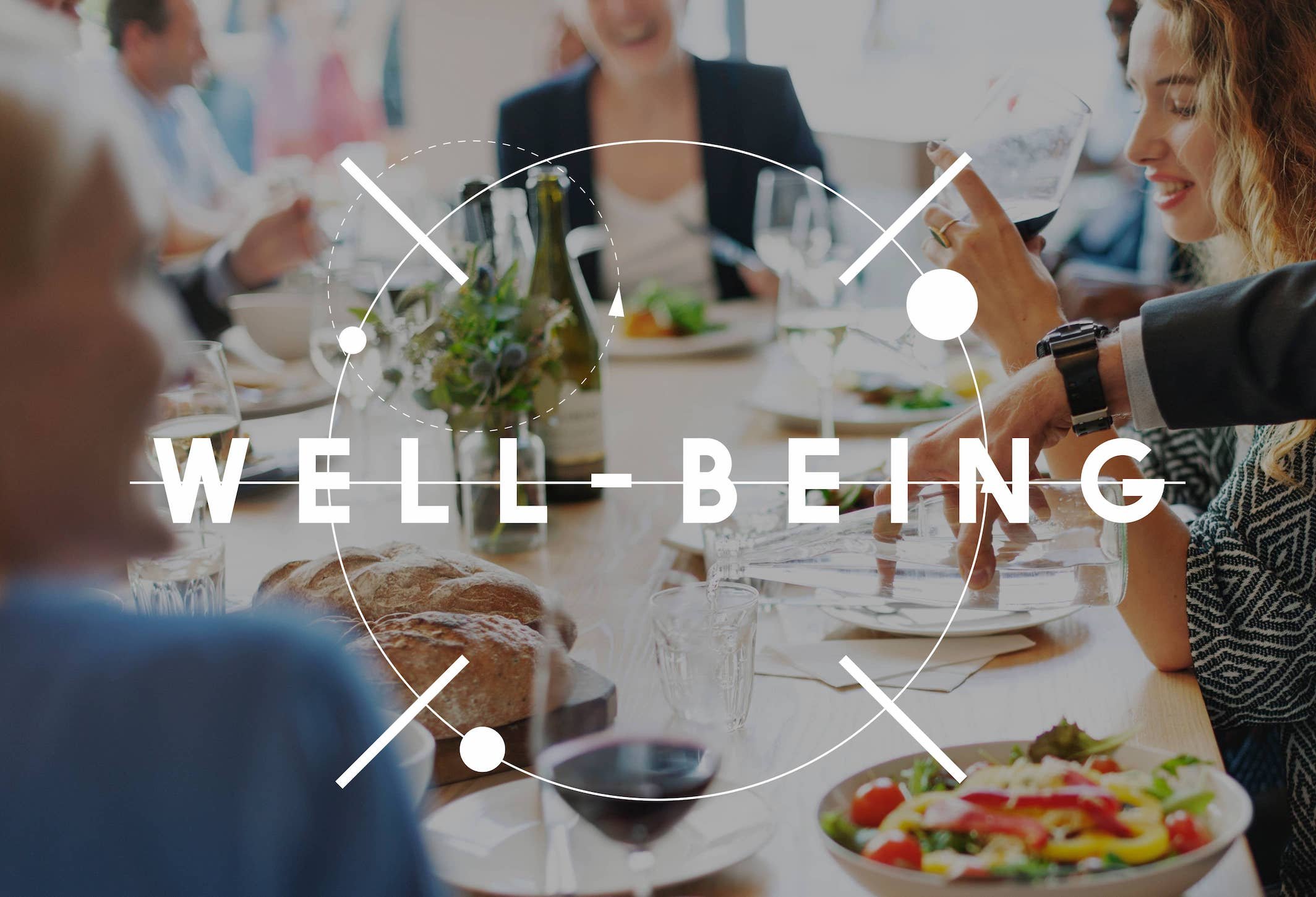 A table full of healthy food and loving friends and family_the essence of Ayurveda is balance and well-being.