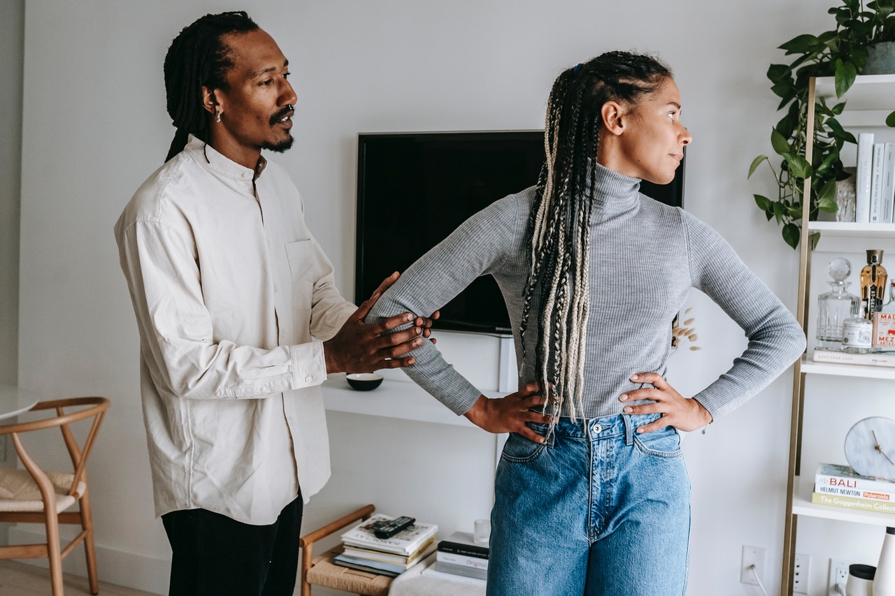 A black couple in a disagreement.