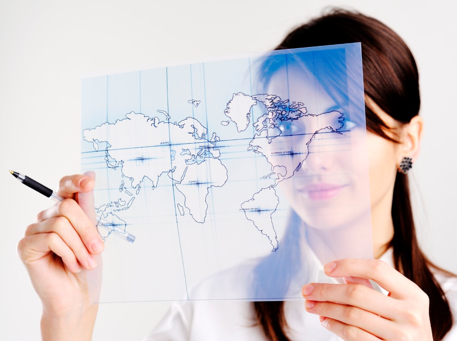 Woman looking a map symbolizing a person's map of reality