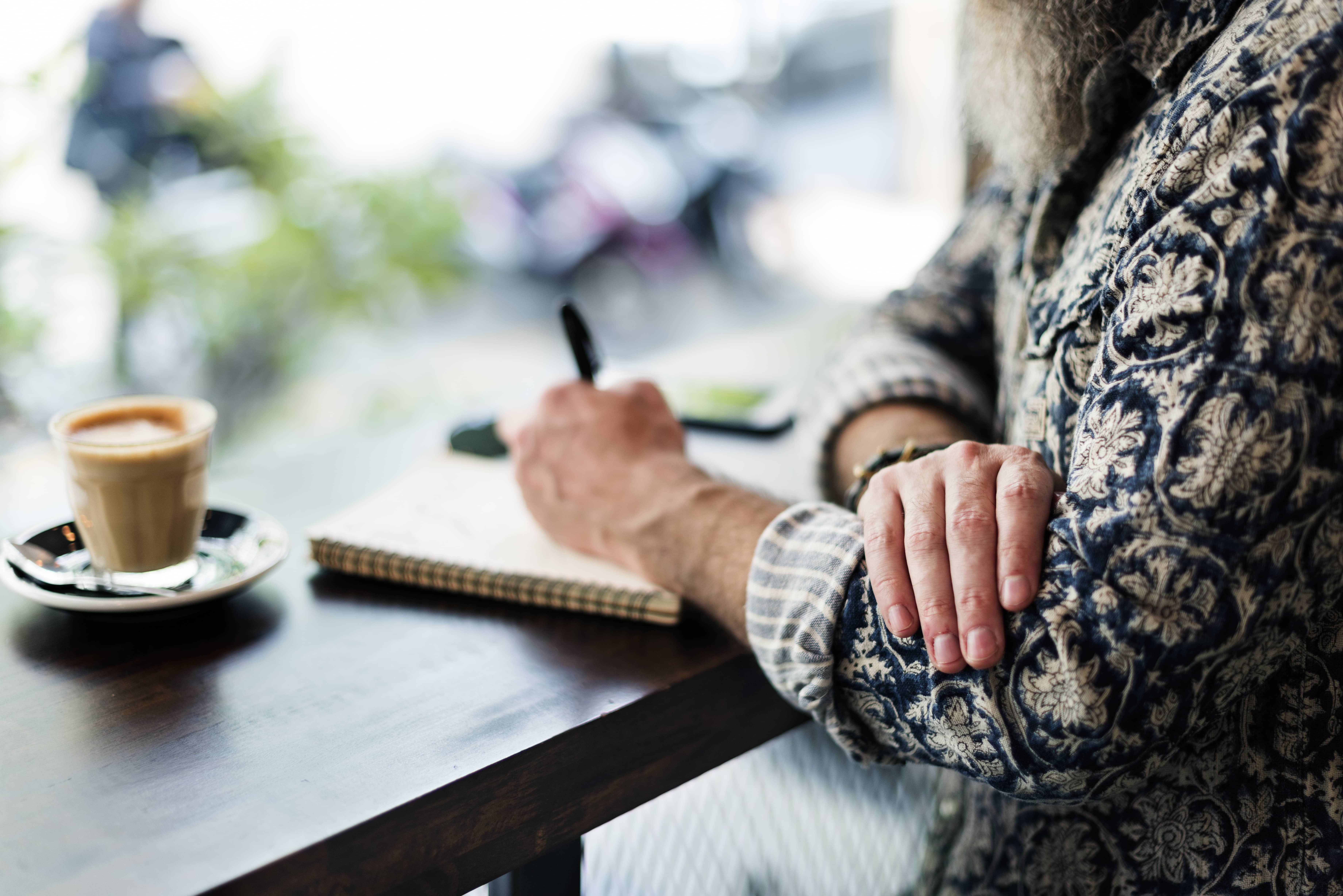 Woman writing in her journal