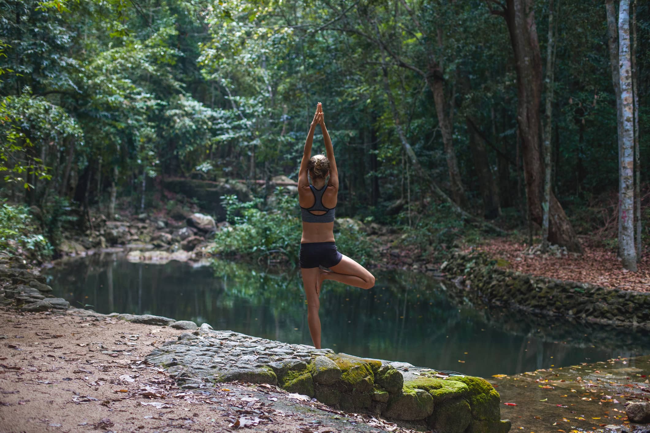 Woman doing a yoga tree pose