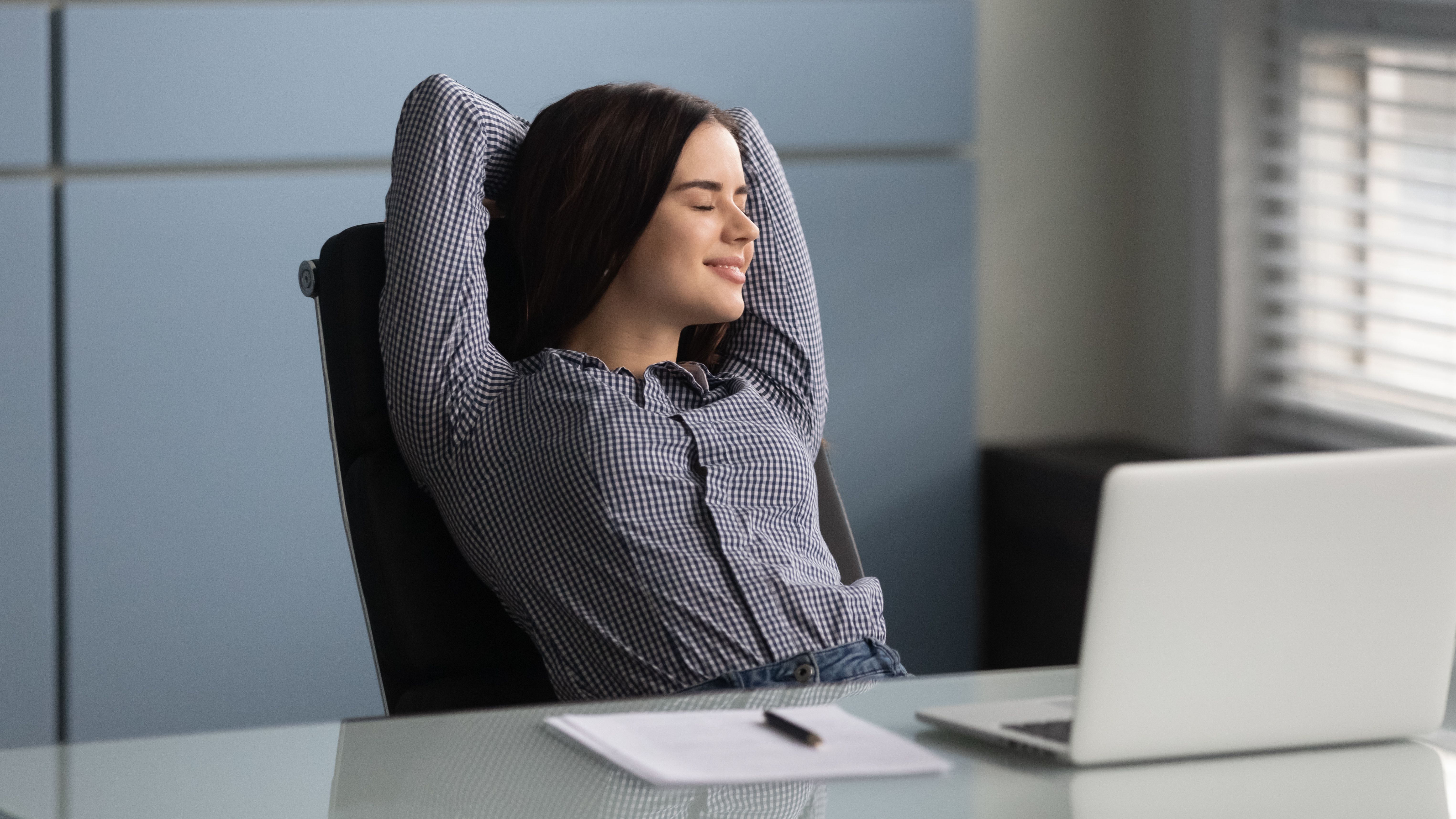 A young woman relaxing while doing a visualization