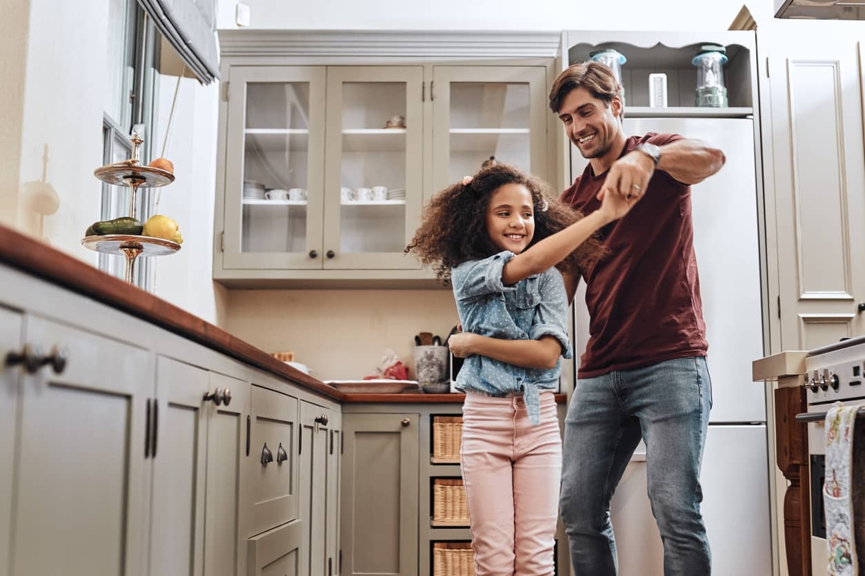 A positive parenting solution: dad redirects his anger into a silly dance with his daughter